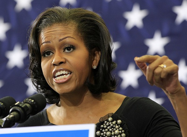 First lady Michelle Obama gestures during a campaign rally for her husband